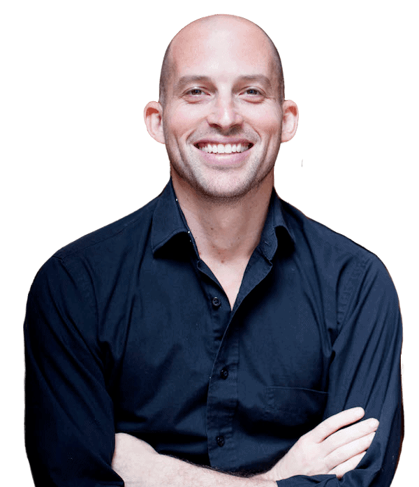 Matt Landau, Founder of VRMB Portrait photo of Matt Landau. He's wearing a dark blue dress shirt. He has a big smile and his arms are crossed.